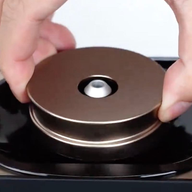 Step 1 — Open the Diffuser

Unlock and open the...